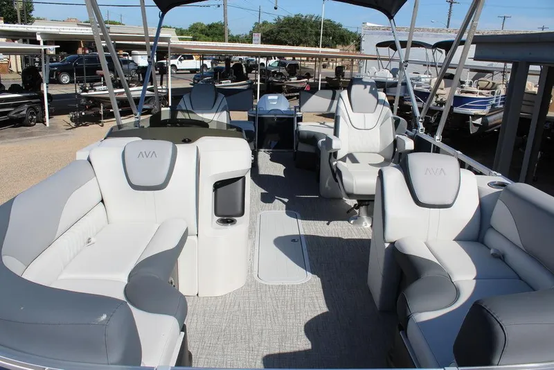 Slide: The Image of 2025 Avalon LSZ Quad Lounger Shift 21 FT pontoon boat with luxurious seating and modern design. - 13