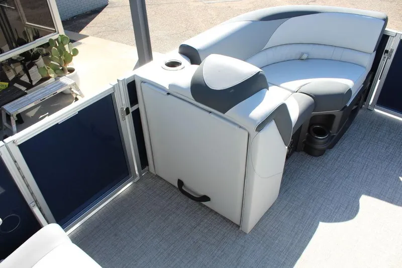 Slide: The Image of 2025 Avalon LSZ Quad Lounger Shift 21 FT interior with plush seating and cup holders. - 22