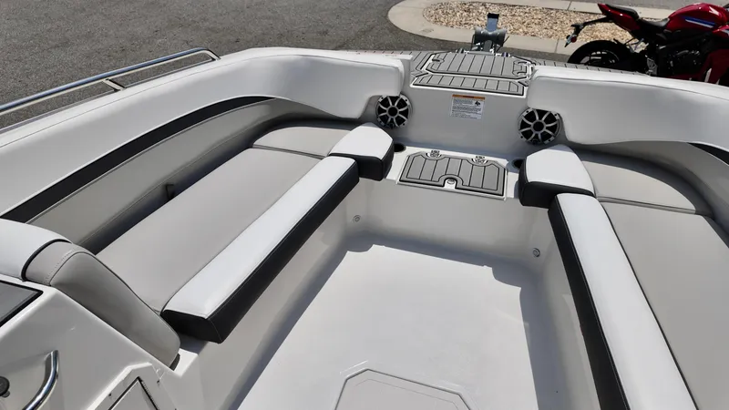 Slide: The Image of 2026 Starcraft SVX 191 OB boat interior with white seating and modern design. - 13