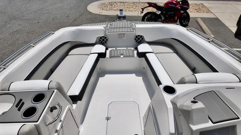 Slide: The Image of 2026 Starcraft SVX 191 OB boat interior with spacious seating and cup holders. - 6