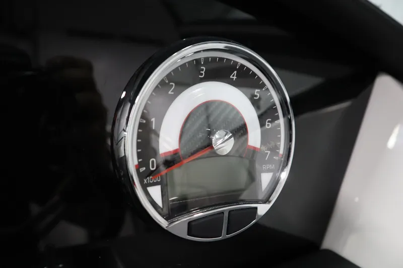 Slide: The Image of Tachometer of 2025 Four Winns H1 Freedom boat, displaying RPM gauge. - 21