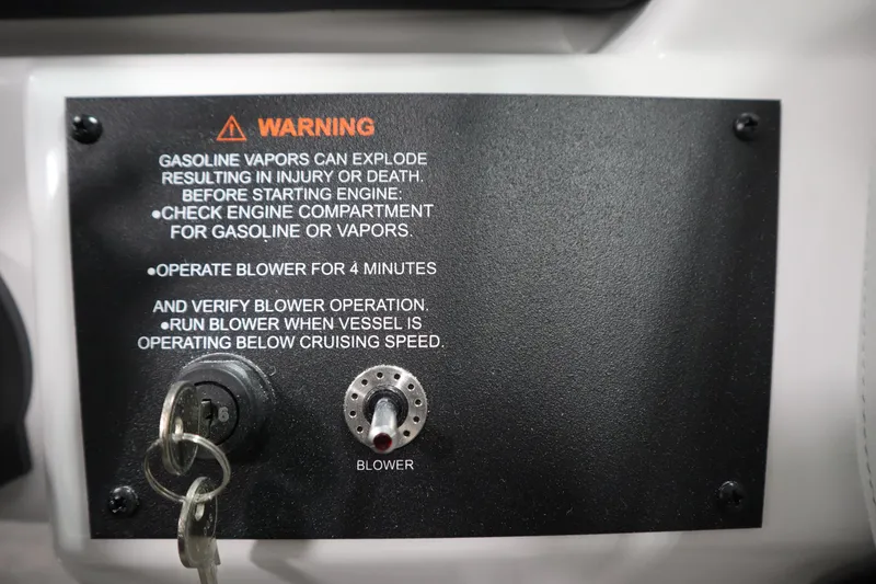 Slide: The Image of Warning label on 2025 Four Winns H1 Freedom boat, emphasizing gasoline vapor safety. - 24