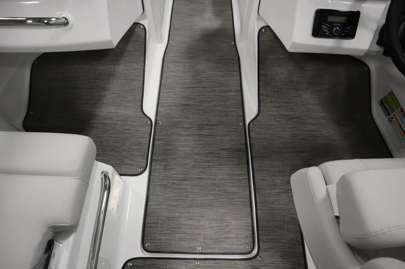 Slide: The Image of 2025 Four Winns H1 Freedom boat interior with sleek flooring and modern design. - 29