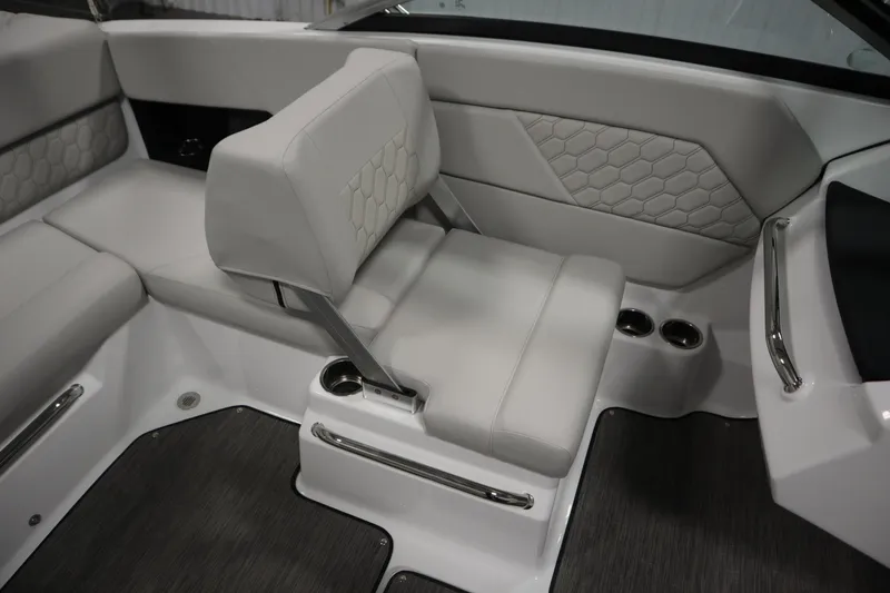 Slide: The Image of 2025 Four Winns H1 Freedom boat interior with gray seating and modern design. - 34