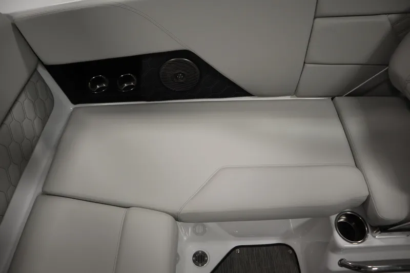 Slide: The Image of 2025 Four Winns H1 Freedom boat interior with sleek gray seating and cup holders. - 37