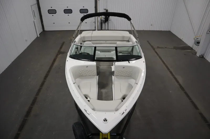 Slide: The Image of 2025 Four Winns H1 Freedom boat in indoor storage, top view. - 9