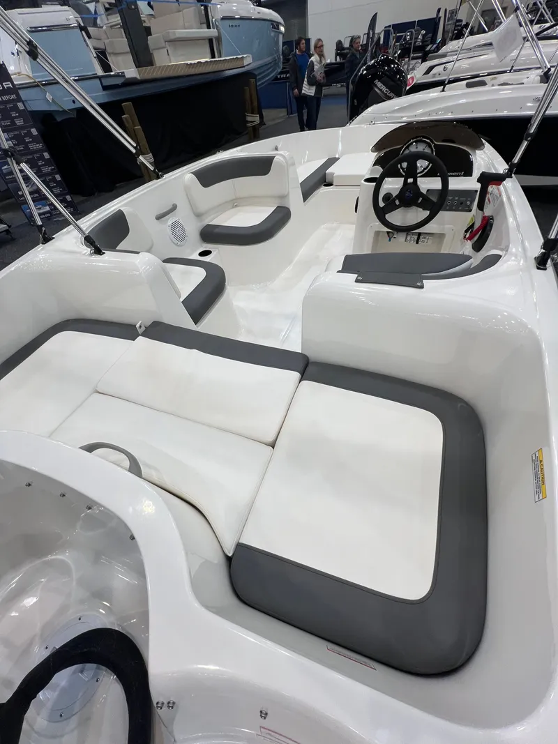 Slide: The Image of Interior of 2026 Bayliner E16LE with white and gray seating. - 11