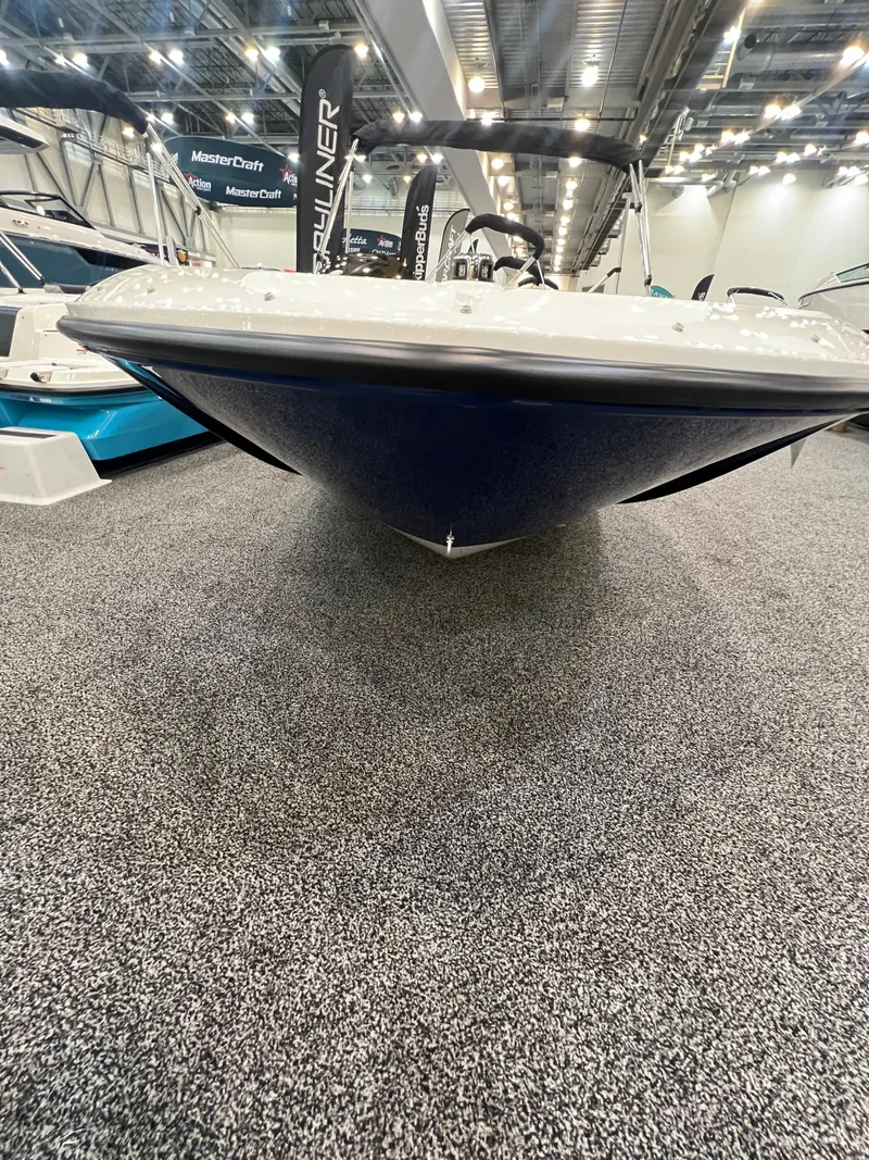 Slide: The Image of Bayliner E16LE 2026 boat displayed on exhibition floor. - 7