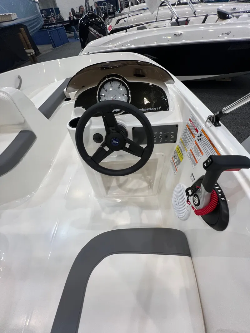 Slide: The Image of Interior view of Bayliner E16LE 2026 helm. - 9