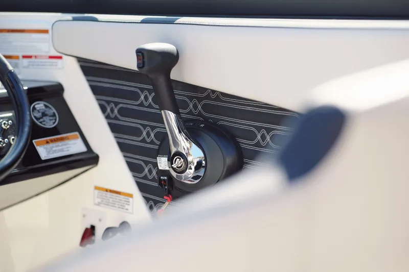 Slide: The Image of Interior of 2026 Sea Ray SPX 210 Outboard with steering console. - 16