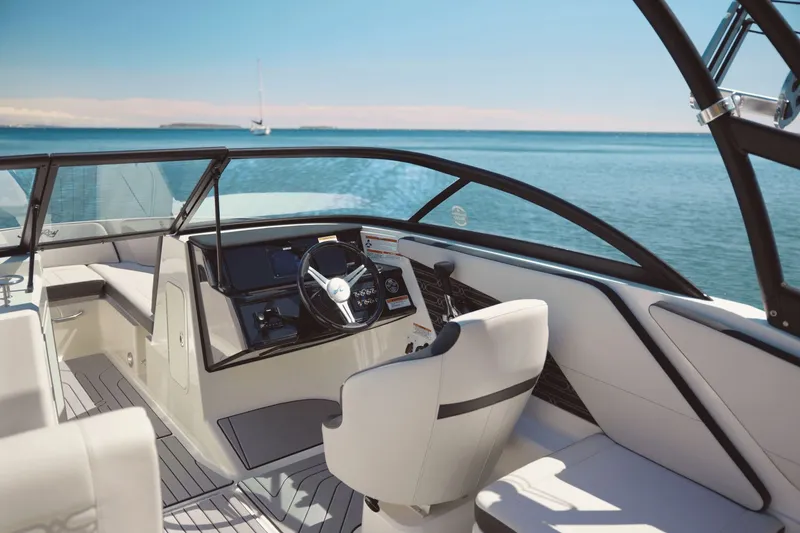 Slide: The Image of Interior of 2026 Sea Ray SPX 210 Outboard with luxurious features. - 9