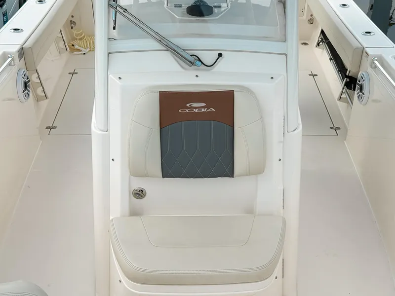 Slide: The Image of 2023 Cobia 280 Center Console boat seat with logo, featuring sleek design and comfortable upholstery. - 25