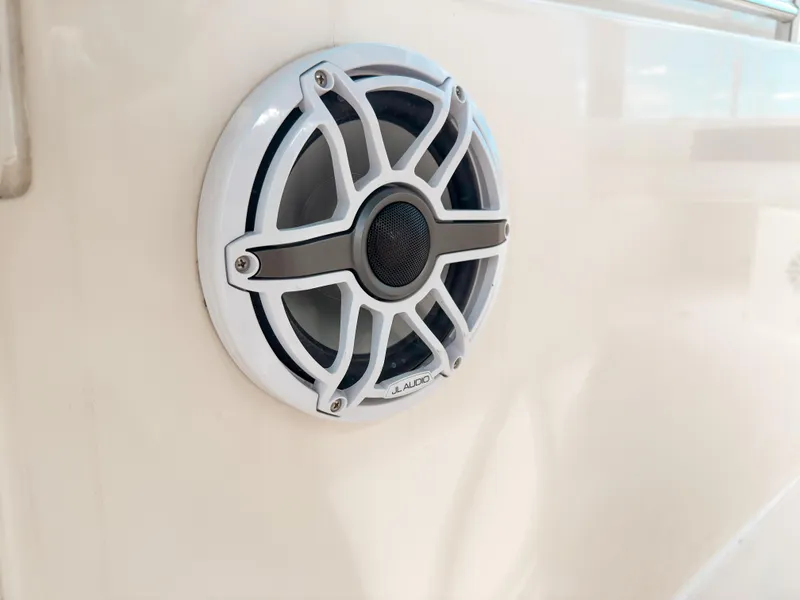 Slide: The Image of Speaker on 2023 Cobia 280 Center Console boat, featuring JL Audio design. - 42