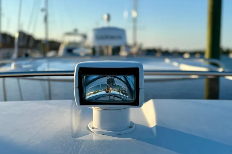 Slide: The Image of Close-up of 2024 Jeanneau NC 1095 boat's navigation light at sunset. - 20