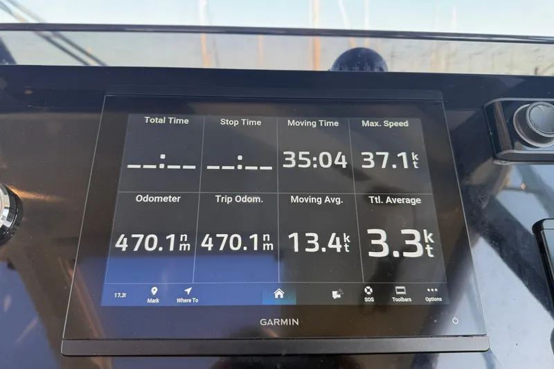 Slide: The Image of Garmin display on 2024 Jeanneau NC 1095 showing nautical data and speed metrics. - 38