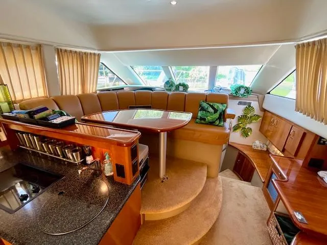 Slide: The Image of Luxurious interior of a 2003 Carver 360 Sport Sedan with elegant seating and modern amenities. - 28