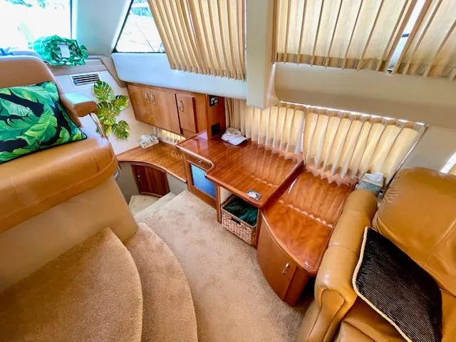 Slide: The Image of Luxurious interior of 2003 Carver 360 Sport Sedan with wood accents and plush seating. - 29
