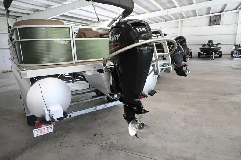 Slide: The Image of 2019 Bennington 22 SSR pontoon boat with Mercury 115 GT engine in a showroom. - 3