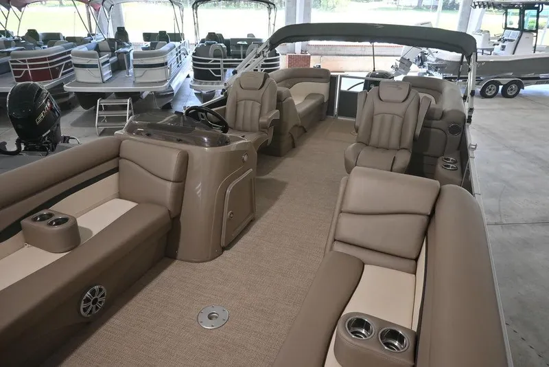 Slide: The Image of 2019 Bennington 22 SSR pontoon boat interior with plush seating and modern design. - 6