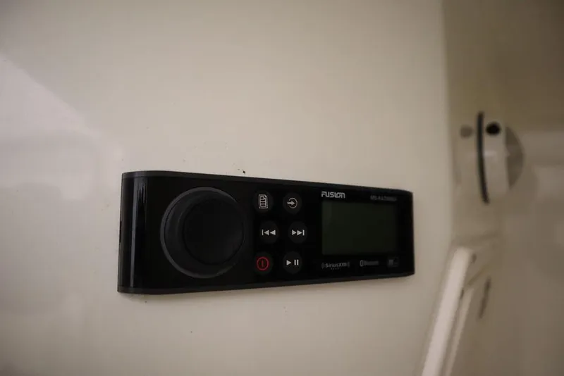 Slide: The Image of Fusion marine stereo system on 2017 Mako 284 CC boat interior. - 29