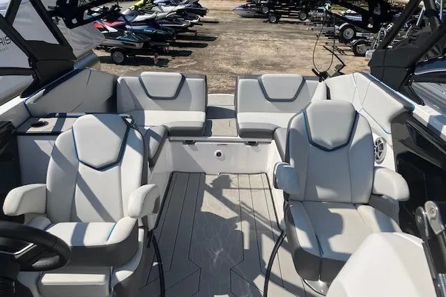Slide: The Image of 2021 Yamaha Boats 252XE interior with modern seating and sleek design. - 15
