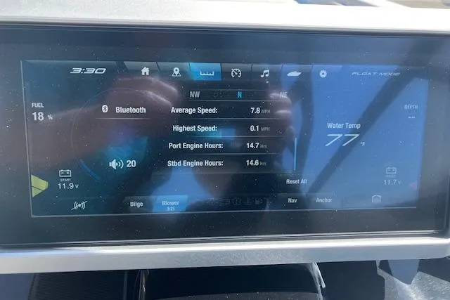 Slide: The Image of Dashboard of 2021 Yamaha Boats 252XE showing speed, engine hours, and water temperature. - 20