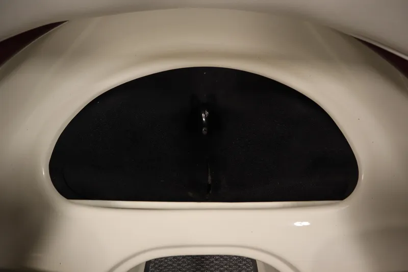 Slide: The Image of 2003 Crownline 202 BR boat interior detail with black and white design. - 15