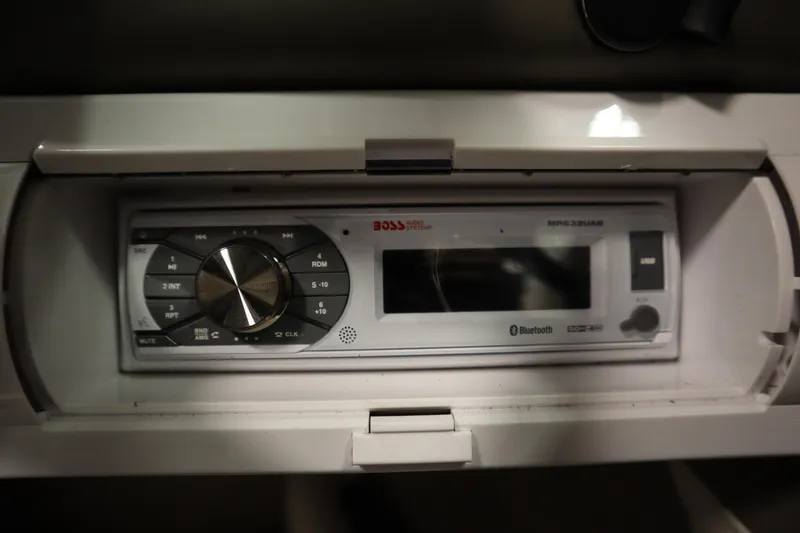 Slide: The Image of Boat stereo system in a 2003 Crownline 202 BR with Bluetooth and USB features. - 28
