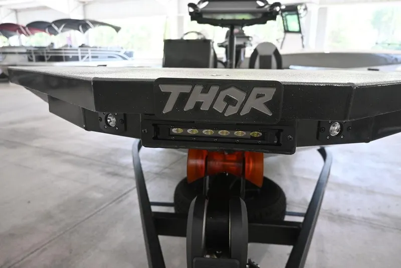 Slide: The Image of Thor Lake Hammer 1900SC 2026 boat front view with logo and LED lights. - 3