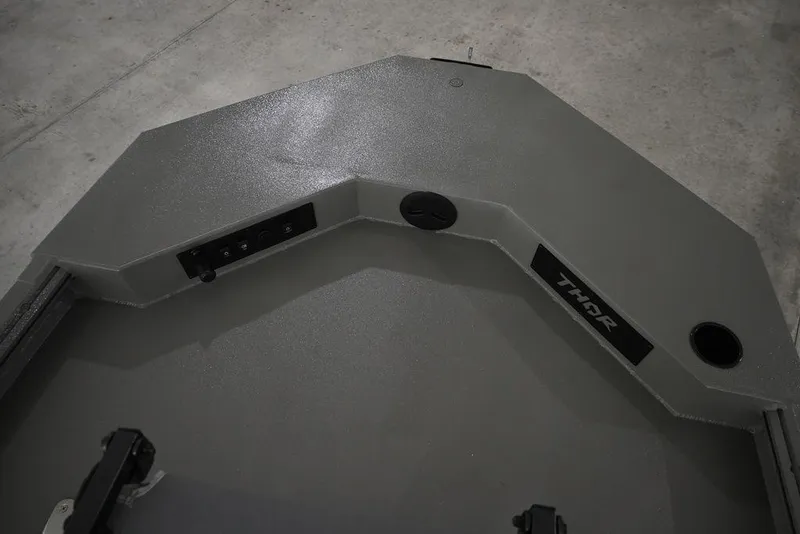 Slide: The Image of Thor Lake Hammer 1900SC 2026 boat interior with control panel and logo. - 7