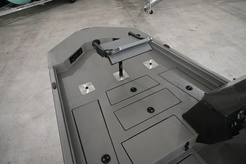 Slide: The Image of 2026 Thor Lake Hammer 1900SC boat interior with storage compartments and seating area. - 8