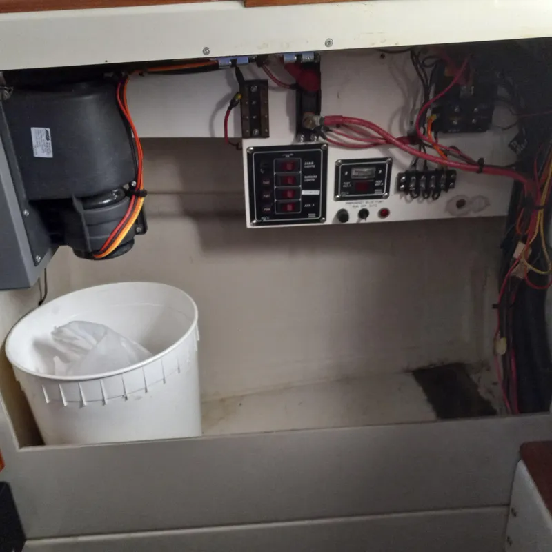 Slide: The Image of Electrical panel and wiring inside a 2005 Ranger Tugs R-21 boat. - 19