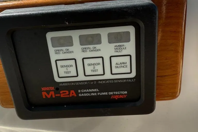Slide: The Image of Gasoline fume detector panel on 1986 Dusky 26 Custom boat dashboard. - 11