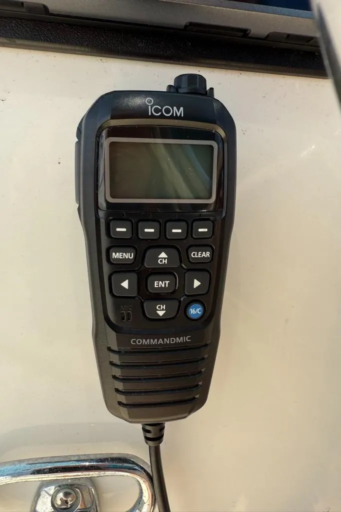 Slide: The Image of Icom CommandMic radio on a Dusky 26 Custom boat, 1986 model. - 13