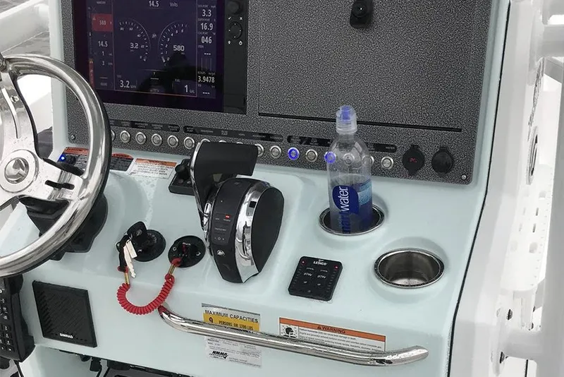 Slide: The Image of 2022 Crevalle 26 HCO boat with Verado 350 engine, featuring sleek deck design. - 17