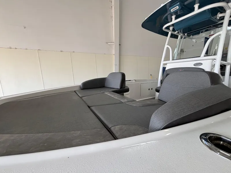 Slide: The Image of 2022 Crevalle 26 HCO boat interior with steering console and seating. - 9