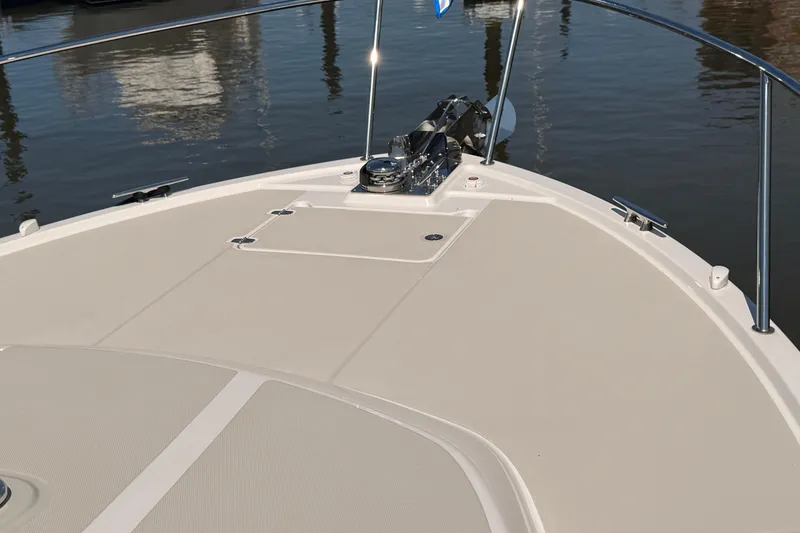 Slide: The Image of Bow of 2026 Back Cove 372 yacht with sleek deck design and railing. - 15