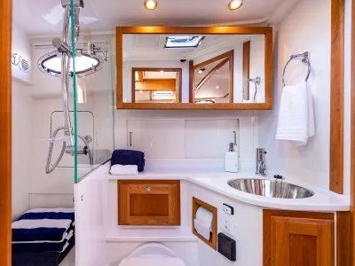 Slide: The Image of Luxurious bathroom in 2026 Back Cove 372 yacht with modern fixtures and wooden accents. - 29