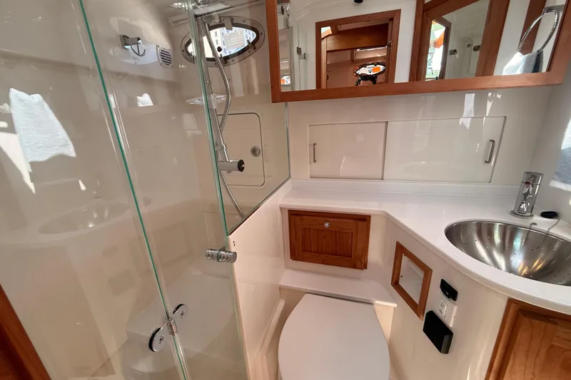 Slide: The Image of Luxurious bathroom in 2026 Back Cove 372 yacht with modern fixtures and wooden accents. - 41