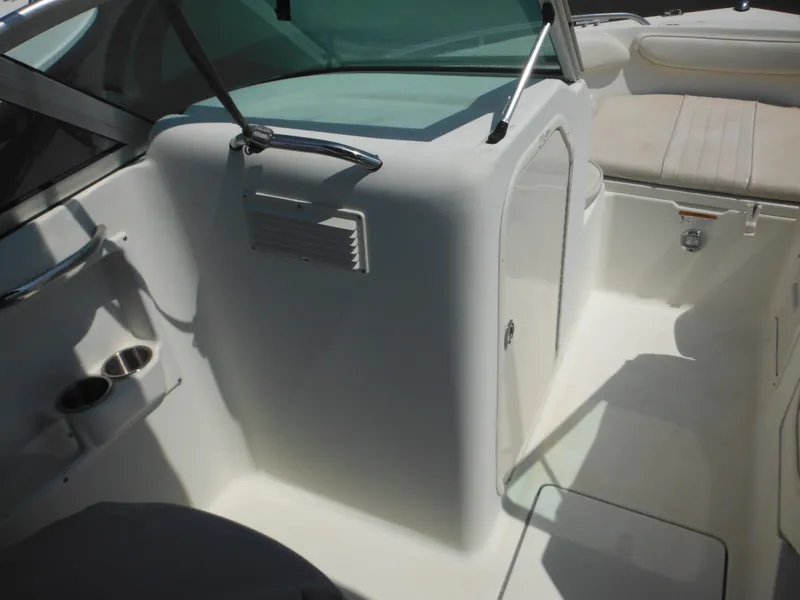 Slide: The Image of 2004 Hydra-Sports Lightning 202 DC boat interior with seating and storage compartments. - 31