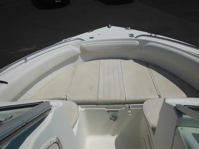 Slide: The Image of 2004 Hydra-Sports Lightning 202 DC boat interior with cushioned seating area. - 35