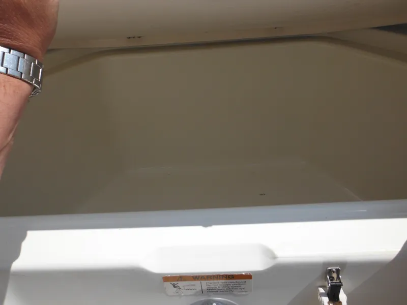 Slide: The Image of Open storage compartment of 2004 Hydra-Sports Lightning 202 DC boat. - 38