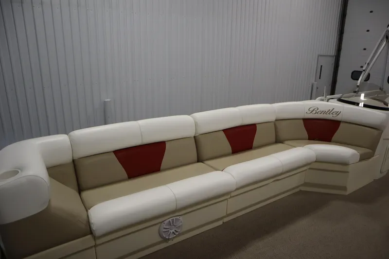 Slide: The Image of 2008 Bentley Pontoons 240 CRUISE interior with beige and red seating. - 14