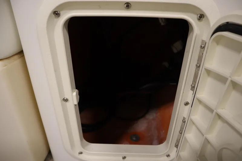 Slide: The Image of Open storage compartment on 2008 Bentley Pontoons 240 CRUISE boat. - 18