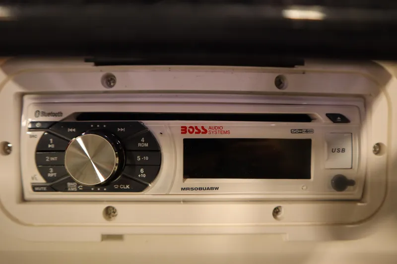 Slide: The Image of Boss Audio Systems stereo in a 2008 Bentley Pontoons 240 CRUISE, featuring Bluetooth and USB connectivity. - 25