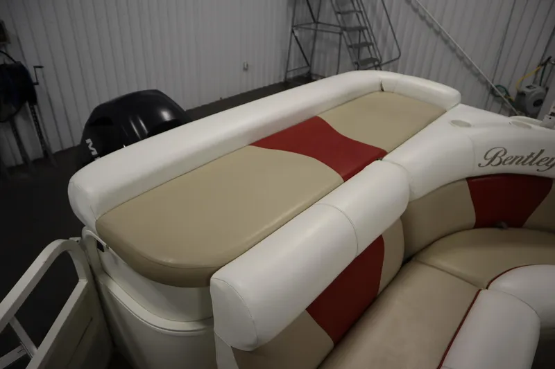 Slide: The Image of 2008 Bentley Pontoons 240 CRUISE boat interior with beige and red seating. - 36
