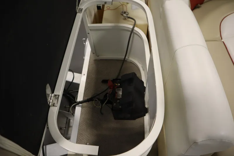 Slide: The Image of Open storage compartment in 2008 Bentley Pontoons 240 CRUISE boat interior. - 37