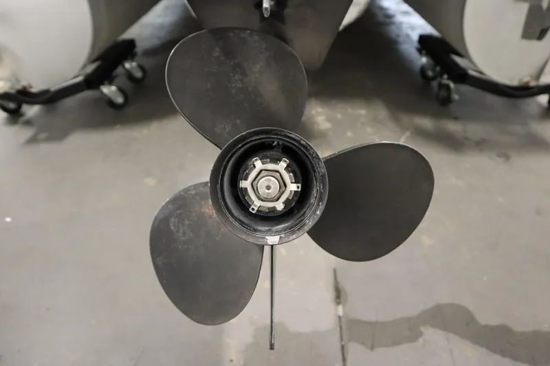 Slide: The Image of Close-up of a 2008 Bentley Pontoons 240 CRUISE boat propeller on a concrete floor. - 43