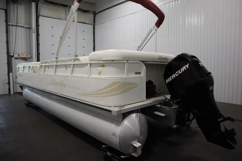 Slide: The Image of 2008 Bentley Pontoons 240 CRUISE with Mercury engine in indoor storage. - 7