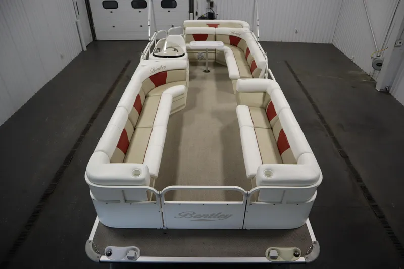Slide: The Image of 2008 Bentley Pontoons 240 CRUISE with spacious seating in a showroom. - 9